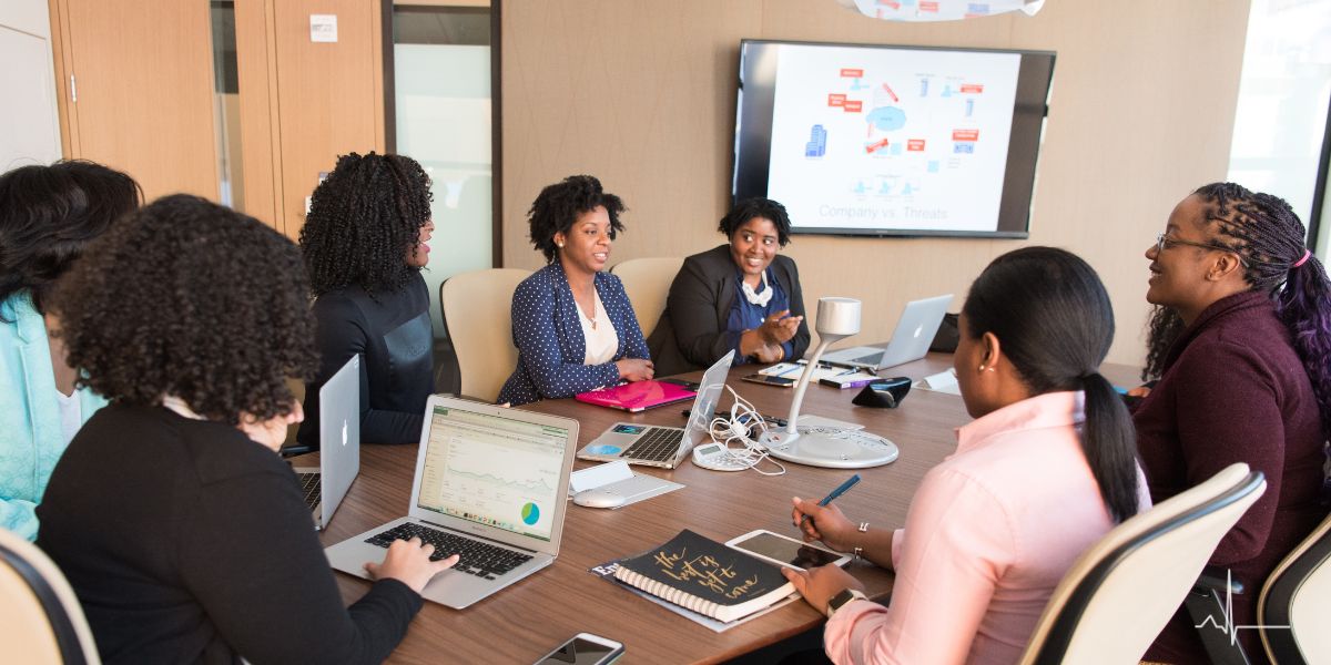 Group working at boardroom table