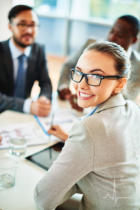 Smiling woman at a desk
